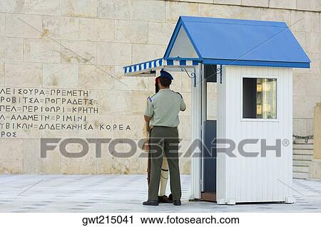 Stock Image - Rear view of a security guard in front of parliament building, Athens, Greece. Fotosearch