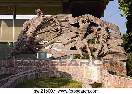 Stock Photo - Sculpture in front of a building, Athens, Greece. Fotosearch