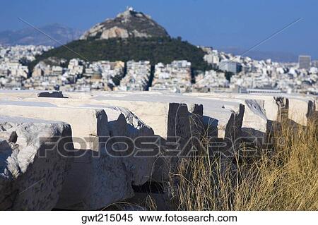 Stones in front of a hill, Lycabettus Hill, Athens, Greece View Large Photo Image Stock Photography - Stones in front of a hill, Lycabettus Hill, Athens, Greece. Fotosearch