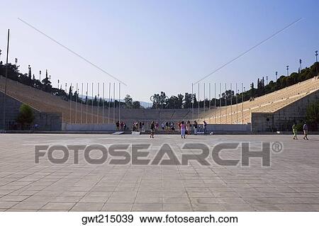 Tourists in an amphitheater, Theater Of Herodes Atticus, Acropolis, Athens, Greece View Large Photo Image Stock Photo - Tourists in an amphitheater, Theater Of Herodes Atticus, Acropolis, Athens, Greece. Fotosearch