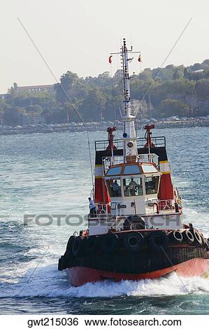 Tugboat moving in a river, Athens, Greece View Large Photo Image Stock Photograph - Tugboat moving in a river, Athens, Greece. Fotosearch