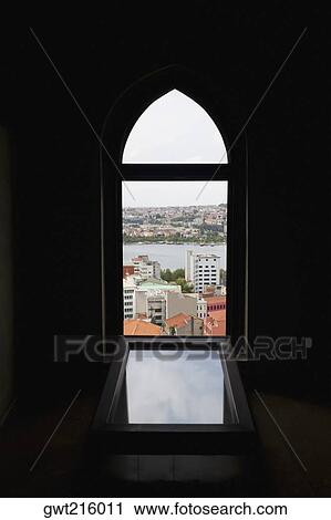 City viewed through an arched window of a building, Istanbul, Turkey View Large Photo Image Stock Image - City viewed through an arched window of a building, Istanbul, Turkey. Fotosearch