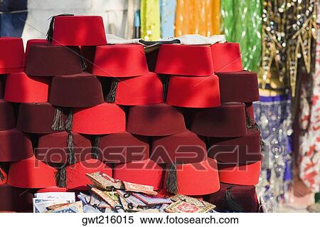 Close-up of caps at a market stall, Istanbul, Turkey View Large Photo Image Stock Photography - Close-up of caps at a market stall, Istanbul, Turkey. Fotosearch