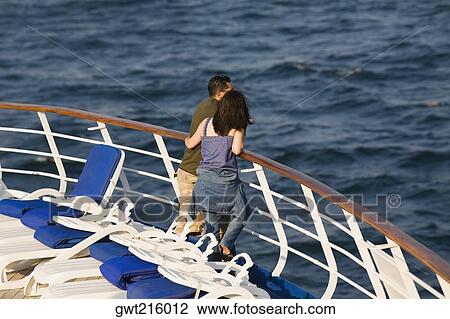 High angle view of a couple leaning against a railing, Istanbul, Turkey View Large Photo Image Stock Image - High angle view of a couple leaning against a railing, Istanbul, Turkey. Fotosearch