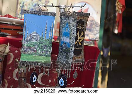 Paintings of mosques hanging at a market stall, Istanbul, Turkey View Large Photo Image Stock Photograph - Paintings of mosques hanging at a market stall, Istanbul, Turkey. Fotosearch