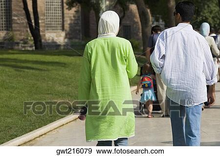 Rear view of tourists walking, Istanbul, Turkey View Large Photo Image Stock Photo - Rear view of tourists walking, Istanbul, Turkey. Fotosearch