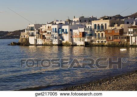 Buildings at the waterfront, Mykonos Town, Mykonos, Cyclades Islands, Greece View Large Photo Image Stock Photography - Buildings at the waterfront, Mykonos Town, Mykonos, Cyclades Islands, Greece. Fotosearch