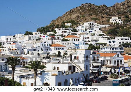 Buildings on the base of a mountain, Patmos, Dodecanese Islands, Greece View Large Photo Image Stock Image - Buildings on the base of a mountain, Patmos, Dodecanese Islands, Greece. Fotosearch