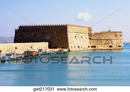 Fortress along the sea, Venetian Fortress, Heraklion Harbour, Crete, Greece View Large Photo Image Stock Image - Fortress along the sea, Venetian Fortress, Heraklion Harbour, Crete, Greece. Fotosearch