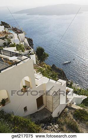 High angle view of buildings on the coast, Greece View Large Photo Image Stock Photography - High angle view of buildings on the coast, Greece. Fotosearch