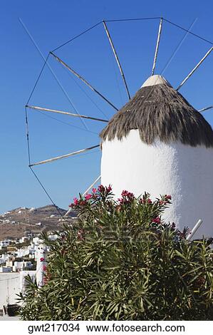 Picture - Low angle view of a traditional windmill, Mykonos, Cyclades Islands, Greece. Fotosearch