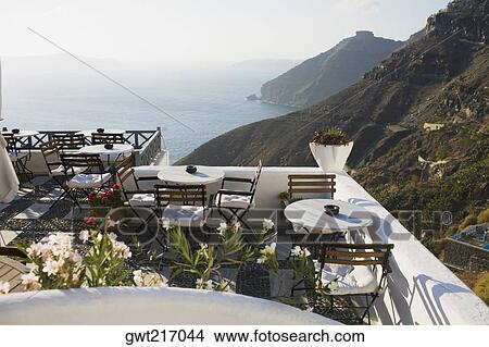 Picture - Restaurant in the terrace at the seaside, Greece. Fotosearch