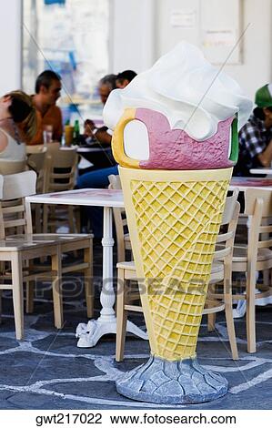 Stock Image - Sculpture of an ice-cream cone at a restaurant, Greece. Fotosearch