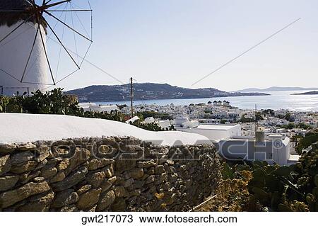 Traditional windmill in a town, Mykonos, Cyclades Islands, Greece View Large Photo Image Stock Image - Traditional windmill in a town, Mykonos, Cyclades Islands, Greece. Fotosearch