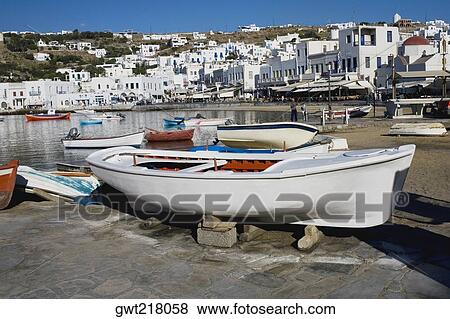 Boat at the dock, Mykonos, Cyclades islands, Greece View Large Photo Image Stock Photo - Boat at the dock, Mykonos, Cyclades islands, Greece. Fotosearch
