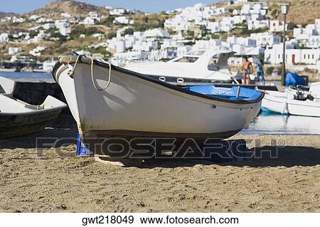 Boat on the beach, Mykonos, Cyclades Islands, Greece View Large Photo Image Stock Photo - Boat on the beach, Mykonos, Cyclades Islands, Greece. Fotosearch