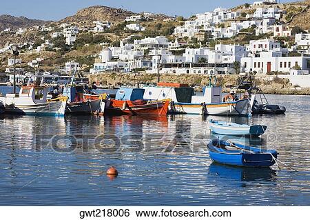 Boats in the sea, Mykonos, Cyclades Islands, Greece View Large Photo Image Stock Photograph - Boats in the sea, Mykonos, Cyclades Islands, Greece. Fotosearch