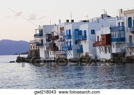 Buildings at the waterfront, Mykonos, Cyclades Islands, Greece View Large Photo Image Stock Image - Buildings at the waterfront, Mykonos, Cyclades Islands, Greece. Fotosearch