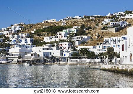 Buildings at the waterfront, Mykonos, Cyclades Islands, Greece View Large Photo Image Stock Photo - Buildings at the waterfront, Mykonos, Cyclades Islands, Greece. Fotosearch