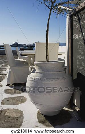Decorative urn in a restaurant, Mykonos, Cyclades Islands, Greece View Large Photo Image Picture - Decorative urn in a restaurant, Mykonos, Cyclades Islands, Greece. Fotosearch