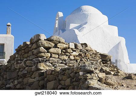 Low angle view of a church, Paraportiani Church, Mykonos, Cyclades Islands, Greece View Large Photo Image Stock Image - Low angle view of a church, Paraportiani Church, Mykonos, Cyclades Islands, Greece. Fotosearch