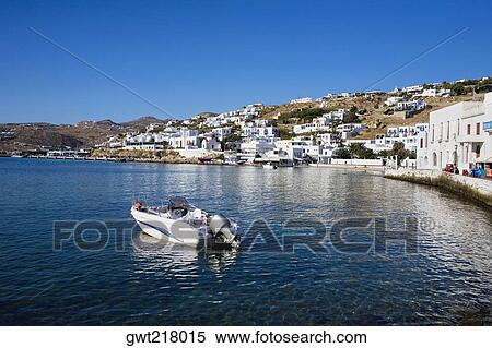 Motorboat in the sea, Mykonos, Cyclades Islands, Greece View Large Photo Image Stock Photography - Motorboat in the sea, Mykonos, Cyclades Islands, Greece. Fotosearch