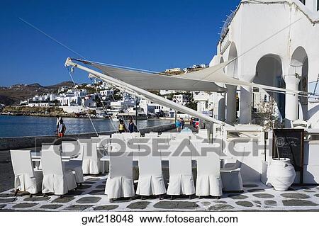 Restaurant on the coast, Mykonos, Cyclades Islands, Greece View Large Photo Image Stock Photo - Restaurant on the coast, Mykonos, Cyclades Islands, Greece. Fotosearch