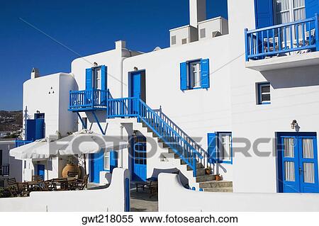 Sidewalk cafe in front of a building, Mykonos, Cyclades Islands, Greece View Large Photo Image Stock Photography - Sidewalk cafe in front of a building, Mykonos, Cyclades Islands, Greece. Fotosearch