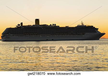 Silhouette of a cruise ship in the sea, Mykonos, Cyclades Islands, Greece View Large Photo Image Stock Image - Silhouette of a cruise ship in the sea, Mykonos, Cyclades Islands, Greece. Fotosearch