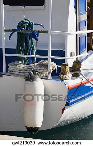 Anchor on the railing of a yacht, Patmos, Dodecanese Islands, Greece View Large Photo Image Stock Photo - Anchor on the railing of a yacht, Patmos, Dodecanese Islands, Greece. Fotosearch