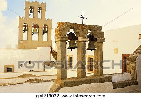 Stock Image - Bells hanging in a church, Agios Ioannis Monastery, Patmos, Dodecanese Islands, Greece. Fotosearch