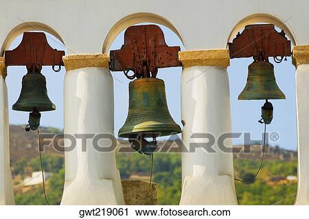 Stock Image - Bells hanging in a church, Monastery of St. John the Divine, Patmos, Dodecanese Islands, Greece. Fotosearch