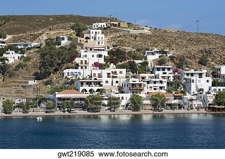Stock Photography - Buildings at the waterfront, Skala, Patmos, Dodecanese Islands, Greece. Fotosearch