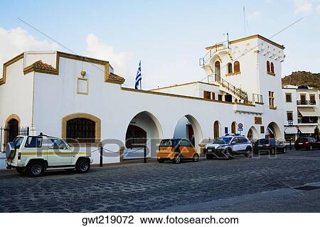 Cars parked in front of a building, Patmos, Dodecanese Islands, Greece View Large Photo Image Stock Image - Cars parked in front of a building, Patmos, Dodecanese Islands, Greece. Fotosearch