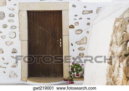 Closed door of a building, Patmos, Dodecanese Islands, Greece View Large Photo Image Stock Image - Closed door of a building, Patmos, Dodecanese Islands, Greece. Fotosearch