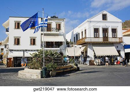 Flag in the center of a city, Patmos, Dodecanese Islands, Greece View Large Photo Image Stock Photo - Flag in the center of a city, Patmos, Dodecanese Islands, Greece. Fotosearch