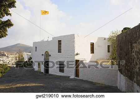 Flag on a monastery, Monastery of the Apocalypse, Patmos, Dodecanese Islands, Greece View Large Photo Image Stock Image - Flag on a monastery, Monastery of the Apocalypse, Patmos, Dodecanese Islands, Greece. Fotosearch