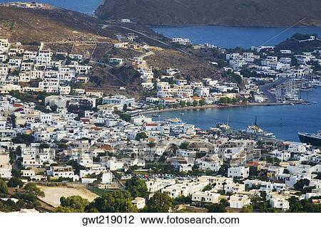 High angle view of a cityscape, Skala, Patmos, Dodecanese Islands, Greece View Large Photo Image Stock Image - High angle view of a cityscape, Skala, Patmos, Dodecanese Islands, Greece. Fotosearch