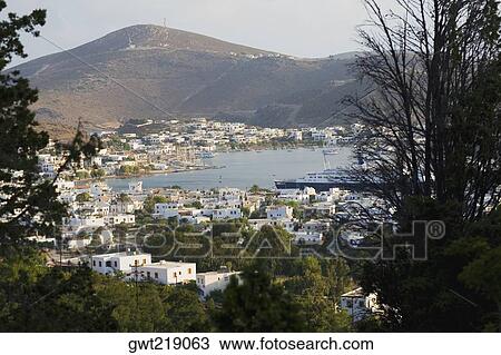 High angle view of a cityscape, Skala, Patmos, Dodecanese Islands, Greece View Large Photo Image Stock Image - High angle view of a cityscape, Skala, Patmos, Dodecanese Islands, Greece. Fotosearch