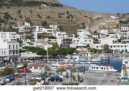 High angle view of a harbor in a city, Skala, Patmos, Dodecanese Islands, Greece View Large Photo Image Stock Photo - High angle view of a harbor in a city, Skala, Patmos, Dodecanese Islands, Greece. Fotosearch