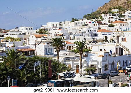 High angle view of buildings in a city, Skala, Patmos, Dodecanese Islands, Greece View Large Photo Image Stock Image - High angle view of buildings in a city, Skala, Patmos, Dodecanese Islands, Greece. Fotosearch