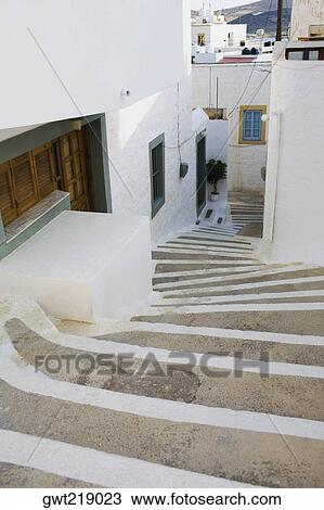 High angle view of steps between buildings, Patmos, Dodecanese Islands, Greece View Large Photo Image Stock Image - High angle view of steps between buildings, Patmos, Dodecanese Islands, Greece. Fotosearch