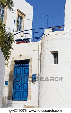 Low angle view of a closed door of a building, Patmos, Dodecanese Islands, Greece View Large Photo Image Stock Photograph - Low angle view of a closed door of a building, Patmos, Dodecanese Islands, Greece. Fotosearch