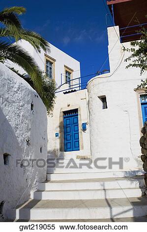 Low angle view of the entrance of a building, Patmos, Dodecanese Islands, Greece View Large Photo Image Stock Photography - Low angle view of the entrance of a building, Patmos, Dodecanese Islands, Greece. Fotosearch