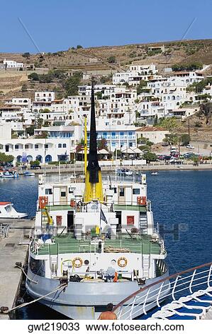 Stock Image - Ship moored at a harbor, Skala, Patmos, Dodecanese Islands, Greece. Fotosearch