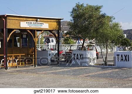 Taxi stand in a city, Patmos, Dodecanese Islands, Greece View Large Photo Image Stock Photo - Taxi stand in a city, Patmos, Dodecanese Islands, Greece. Fotosearch