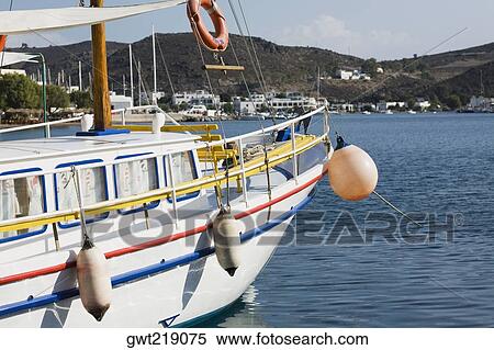 Stock Photography - Yacht moored in the sea, Skala, Patmos, Dodecanese Islands, Greece. Fotosearch