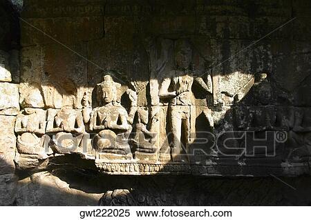 Close-up of sculptures carved on the wall of a temple, Angkor Wat, Siem Reap, Cambodia View Large Photo Image Stock Photography - Close-up of sculptures carved on the wall of a temple, Angkor Wat, Siem Reap, Cambodia. Fotosearch