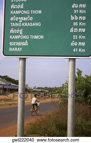 Stock Image - Distance signboard at the roadside, Siem Reap, Cambodia. Fotosearch