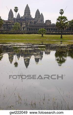 Reflection of a temple in a pond, Angkor Wat, Siem Reap, Cambodia View Large Photo Image Stock Photo - Reflection of a temple in a pond, Angkor Wat, Siem Reap, Cambodia. Fotosearch